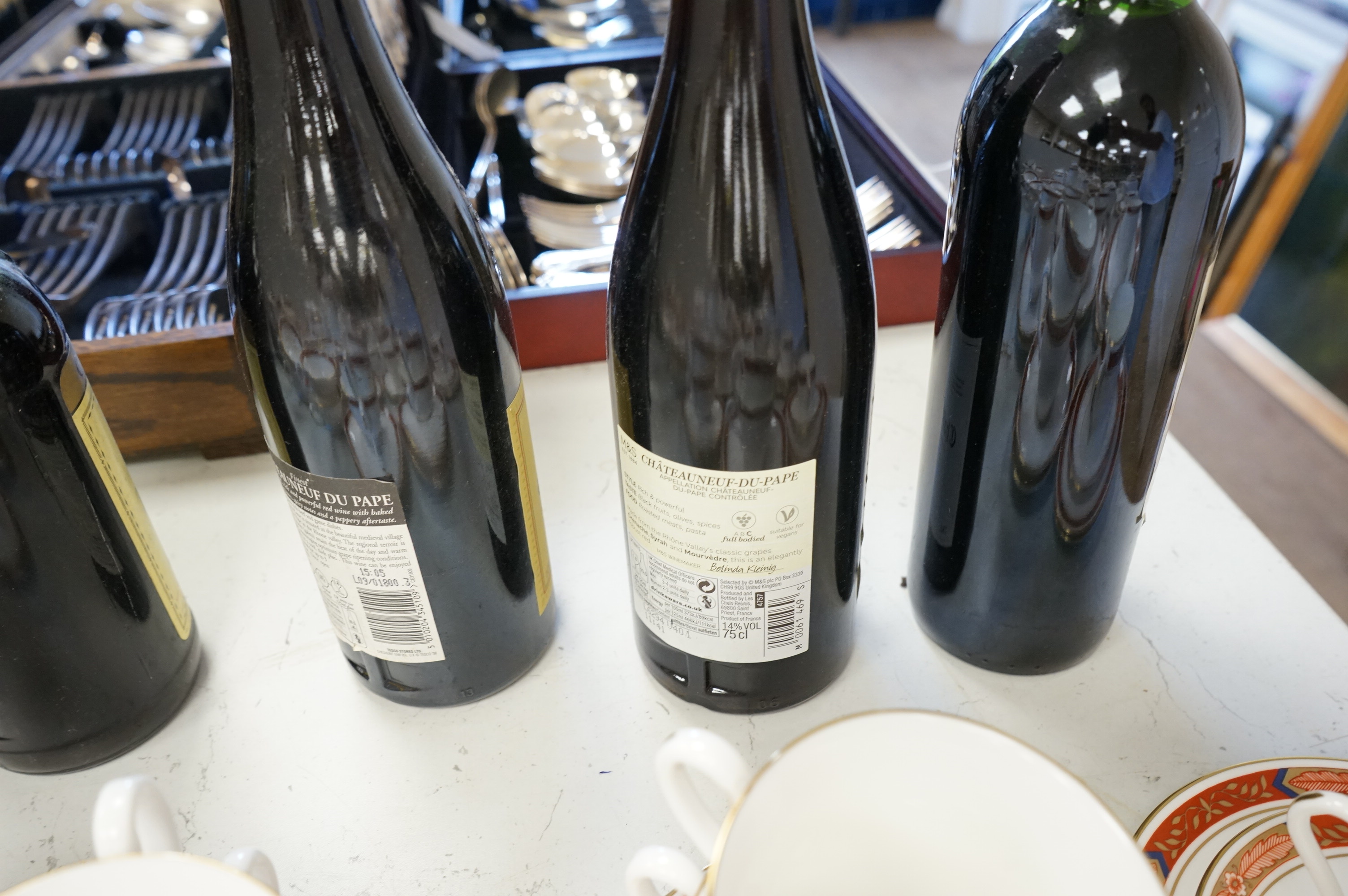 Eight bottles of red wine including three bottles of Chateau Talbot Saint Julien 1975, Chateauneuf du Pape 2008, Chateau Caronne Ste Gemme 1988 etc.